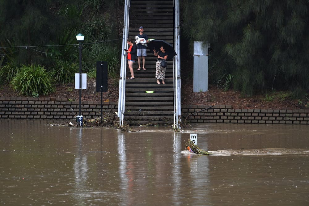 dies floodwaters Central Coast