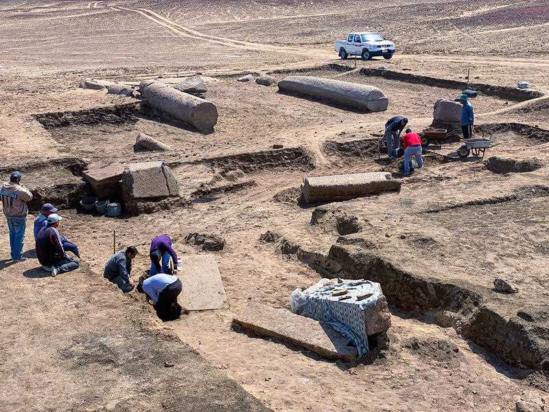 archeologists working in the ruins of a temple for Zeus-Kasios, the ancient Greek god, at the Tell el-Farma archaeological site in the northwestern corner of the Sinai Peninsula