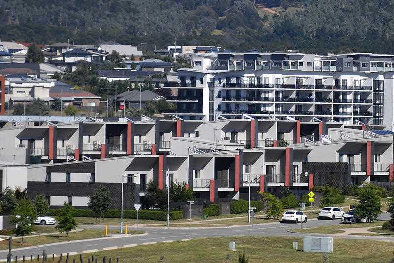 New apartment buildings are seen on a housing estate in the Canberra suburb of Wright