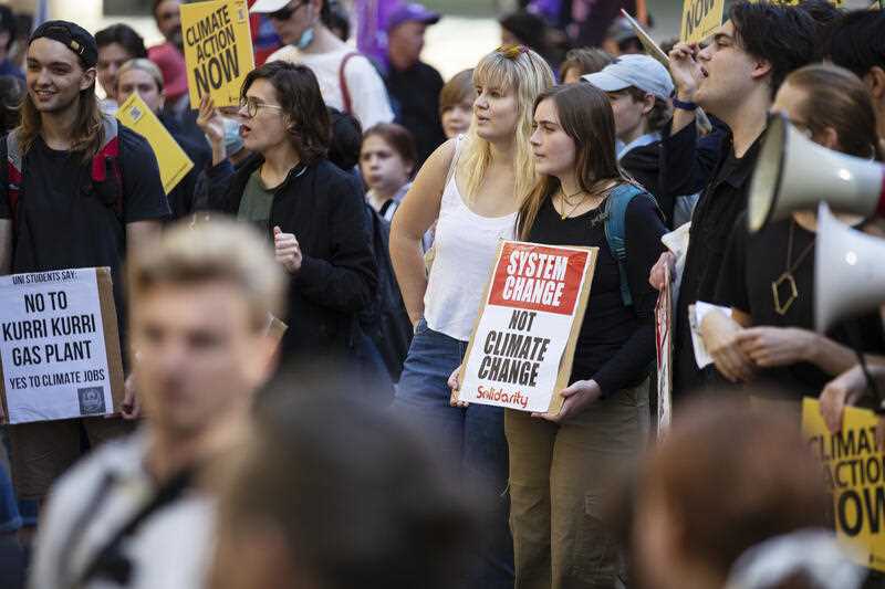 young protesters gather and march in a School Strike 4 Climate protest on Friday 6 may 2022