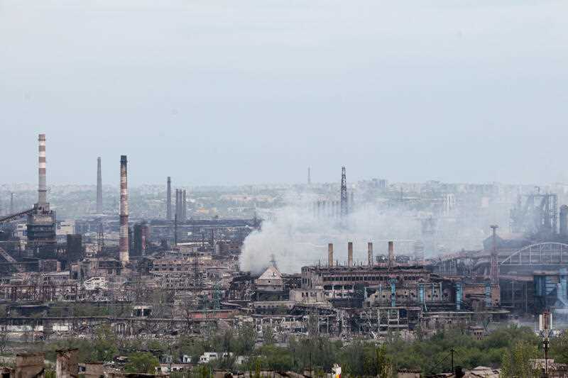 Smoke rises from the Metallurgical Combine Azovstal in Mariupol, in territory under the government of the Donetsk People's Republic, eastern in Mariupol, Ukraine, Thursday, May 5, 2022