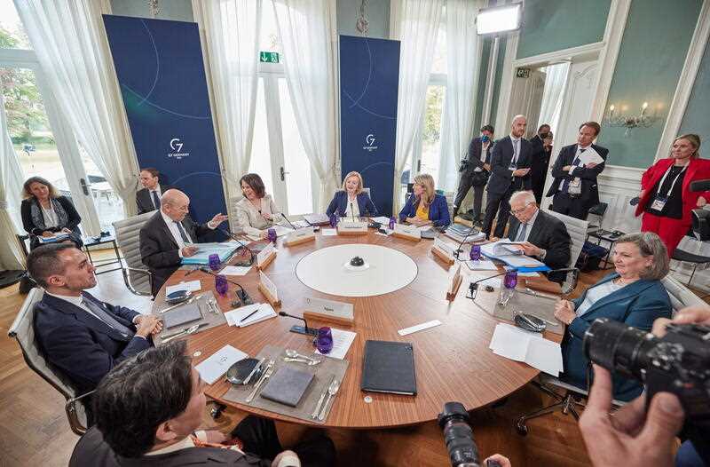 German Foreign Minister Annalena Baerbock (C) chairs the round table meeting during the G7 Foreign Ministers Summit in Wangels, Germany, 13 May 2022