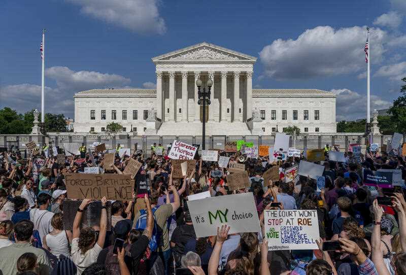 Abortion-rights and anti-abortion demonstrators gather outside of the Supreme Court in Washington, Friday, June 24, 2022