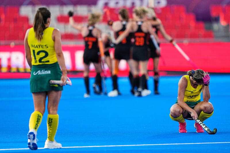 Australia's players react after their defeat following the FIH Hockey Women's World Cup 2022 semifinal hockey match between Netherlands and Australia held at Olympic Stadium in Terrassa, Barcelona, Spain, 16 July 2022