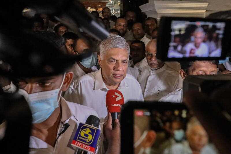 Sri Lankan newly elected President Ranil Wickremesinghe arrives at the Buddhist temple in Colombo, Sri Lanka, 20 July 2022