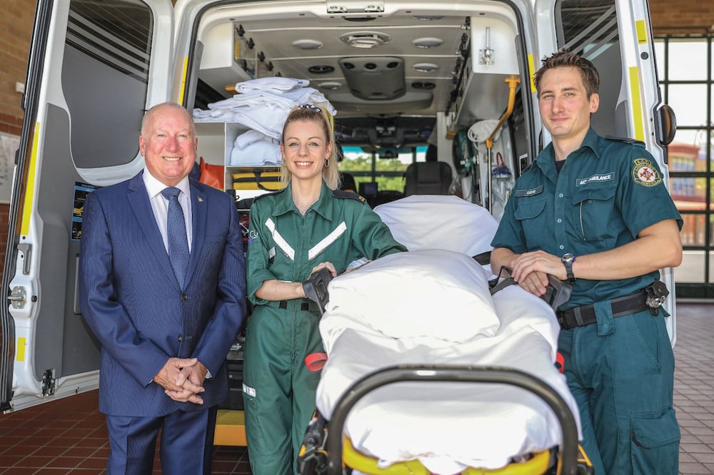 Mick Gentleman, ACT Minister for Police and Emergency Services, and ambulance paramedics. File photo.