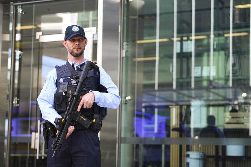 An Australian Federal Police (AFP) officer holds a Mk18 Short-Barrel Rifle at Canberra Airport