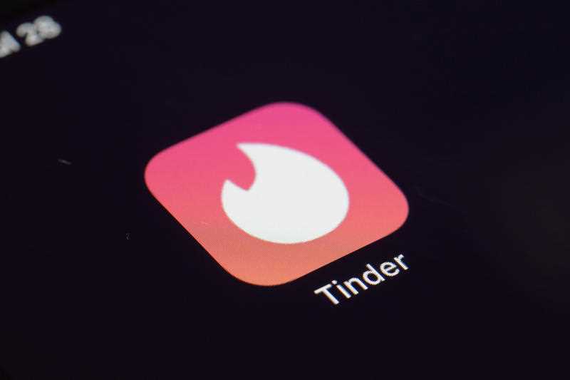 the icon for the Tinder dating app is seen on on a device