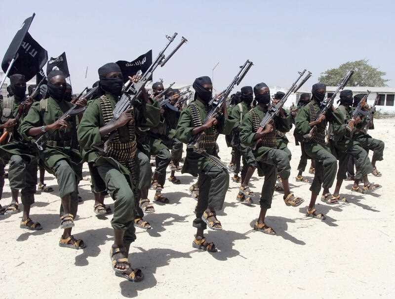 Hundreds of newly trained al-Shabab fighters perform military exercises in the Lafofe area some 18 km south of Mogadishu, in Somalia in 2011