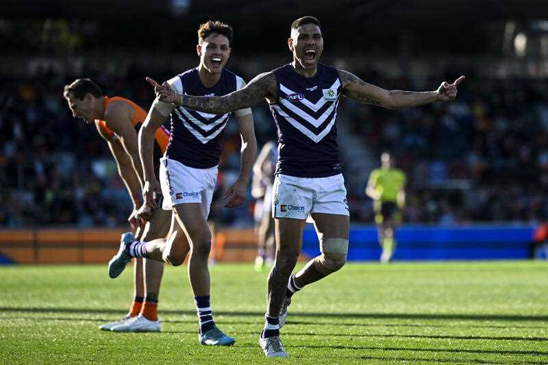 Michael Walters of the Dockers celebrates after scoring a goal during the AFL Round 23 match between the GWS Giants and the Fremantle Dockers at Manuka Stadium in Canberra, Saturday, August 20, 2022