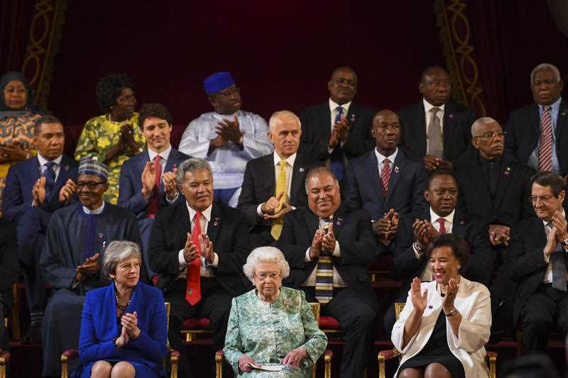 Queen Elizabeth II surrounded by 18 Commonwealth Heads of Government in London in 2018