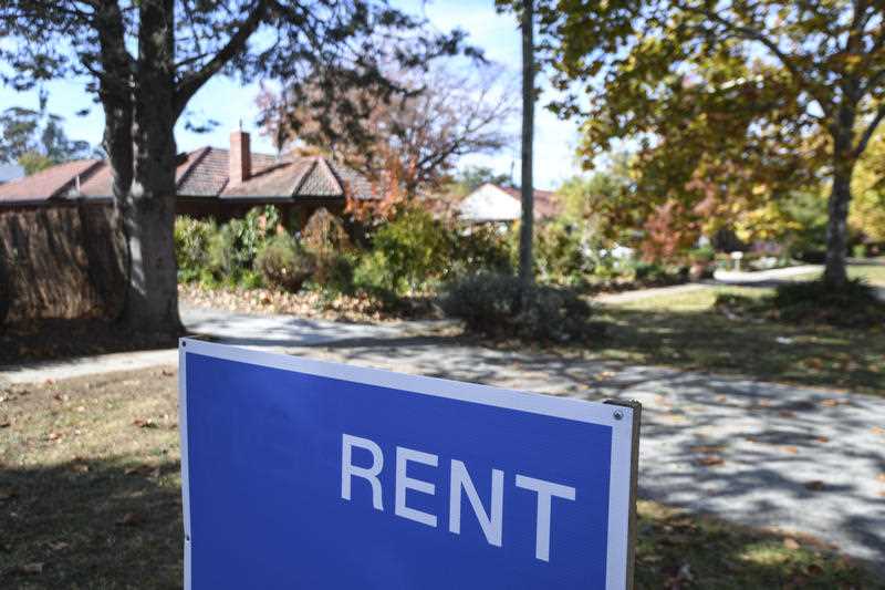 A 'for rent' sign is seen outside a house in Canberra