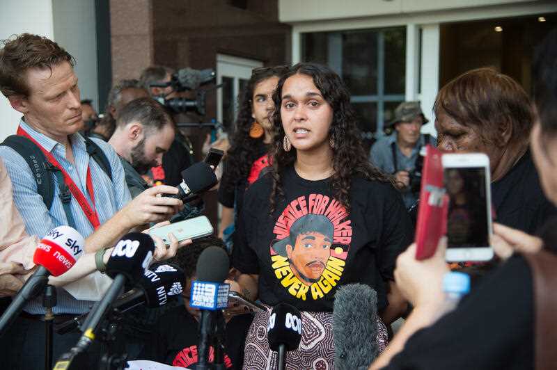 Kumanjayi Walker's cousin Samara Fernandez Brown speaks to the media outside the Northern Territory Supreme Court in Darwin, Friday, March 11, 2022.