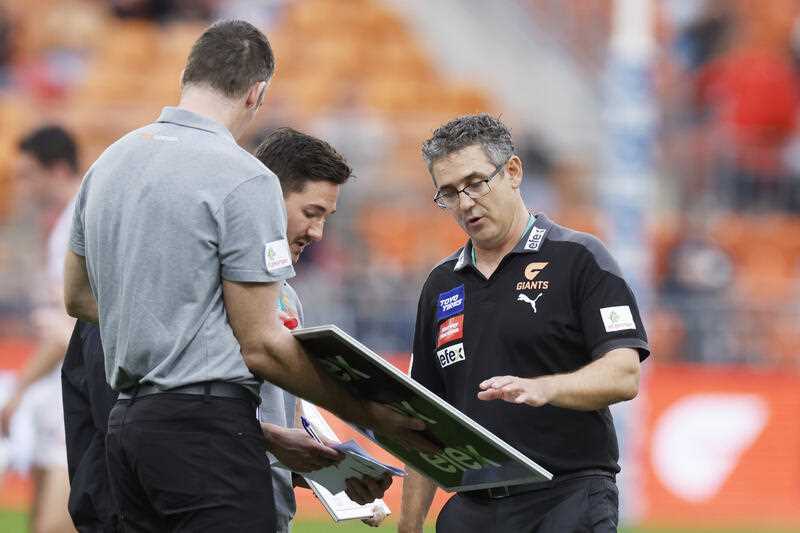 Giants coach Leon Cameron is seen at quarter time during the AFL Round 9 match between the GWS Giants and the Carlton Blues at Giants Stadium in Sydney, Sunday, May 15, 2022