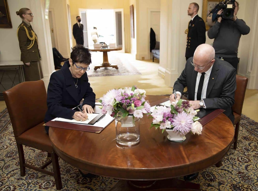 Governor-General David Hurley and Mrs Hurley signing the condolence book for Her Majesty the Queen at Government House, Yarralumla