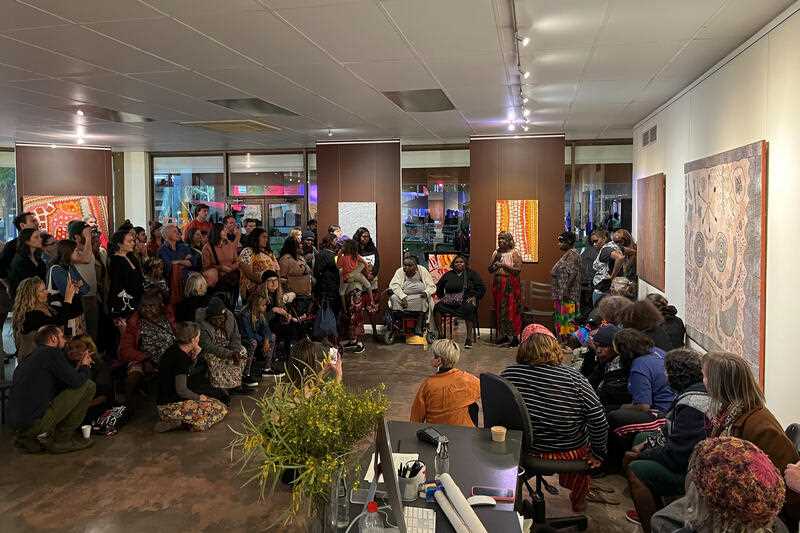 guests at the opening of an exhibition of the Papunya Tula gallery in Alice Springs