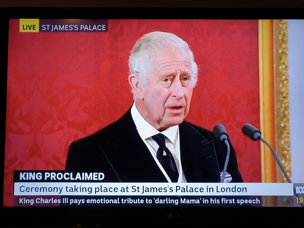King Charles III is seen speaking on television