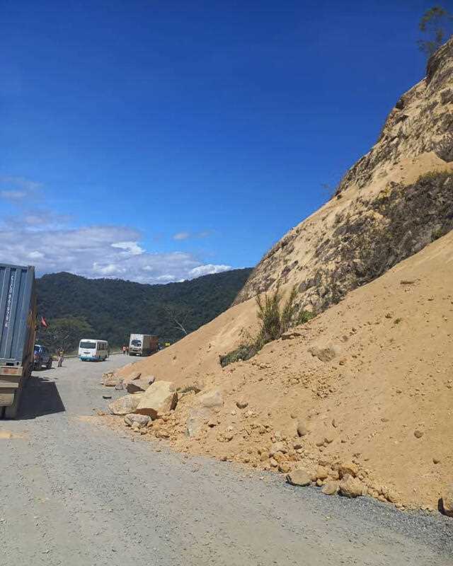 Debris lies strewn across a highway following a landslide near the town of Kainantu, following a 7.6-magnitude earthquake in northeastern Papua New Guinea, Sunday, Sept. 11, 2022