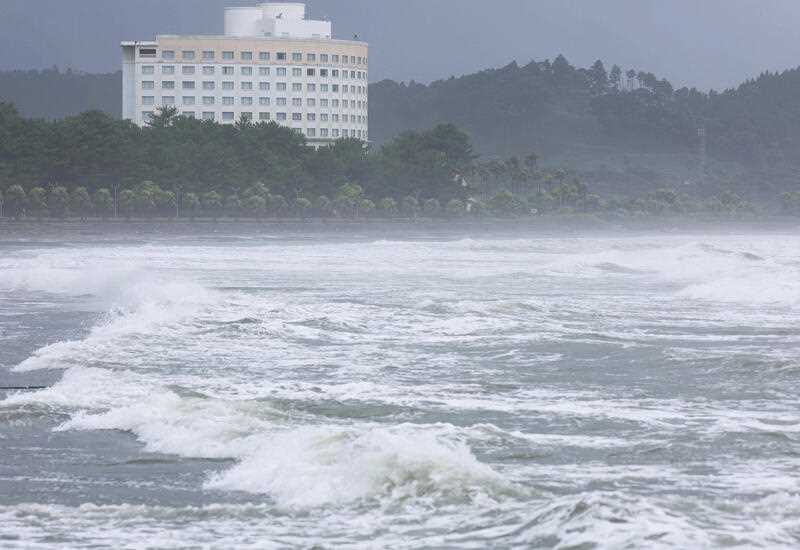 High waves crash on the shore in Miyazaki City, Miyazaki Prefecture, western Japan