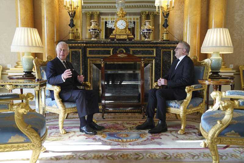 King Charles III sits with Prime Minister of Australia Anthony Albanese, as he receives realm prime ministers in the 1844 Room at Buckingham Palace in London, Saturday, Sept. 17, 2022