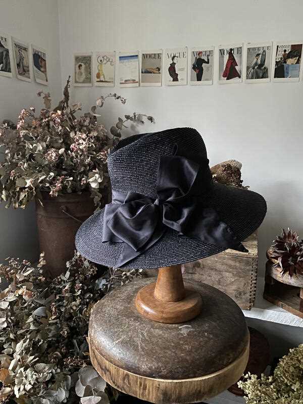 A supplied image obtained on Monday, September 19, 2022, of a hat to be worn by founder of the Sober in the Country charity Shanna Whan at Queen Elizabeth II's funeral. (AAP Image/Supplied)