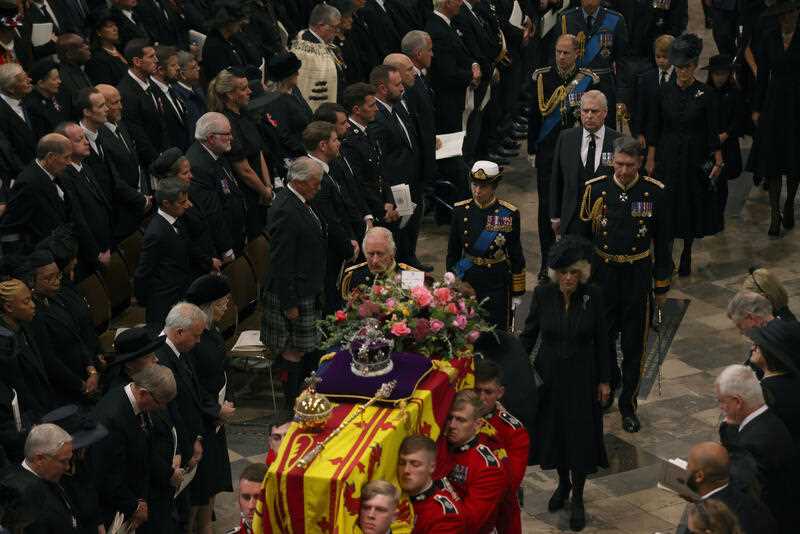 King Charles III, Camilla, Queen Consort and other members of the Royal family follow the coffin of Queen Elizabeth II as it is carried into Westminster Abbey ahead of her State Funeral, in London, Monday Sept. 19, 2022