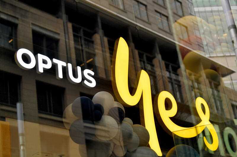 Signage is seen at an Optus store in Sydney