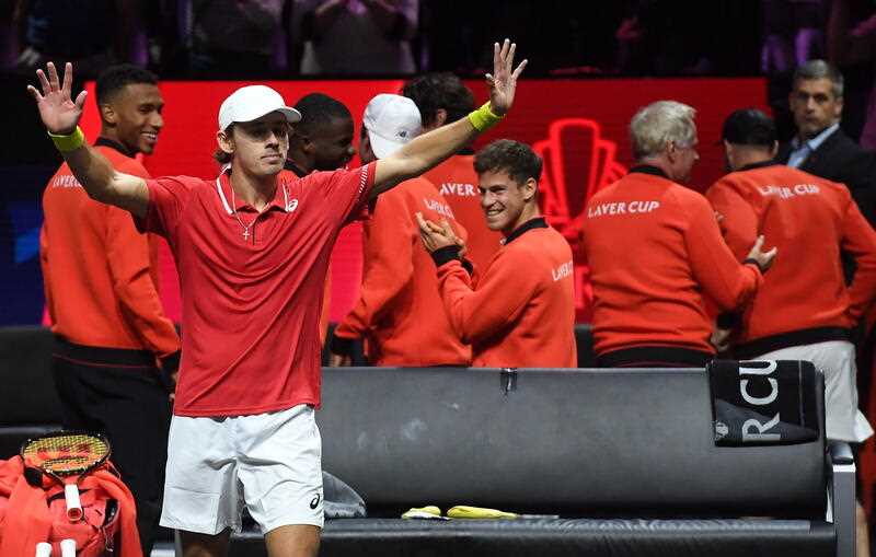 Australian player Alex de Minaur of Team World celebrates after winning his match against British player Andy Murray of Team Europe on the first day of the Laver Cup tennis tournament in London, Britain, 23 September 2022