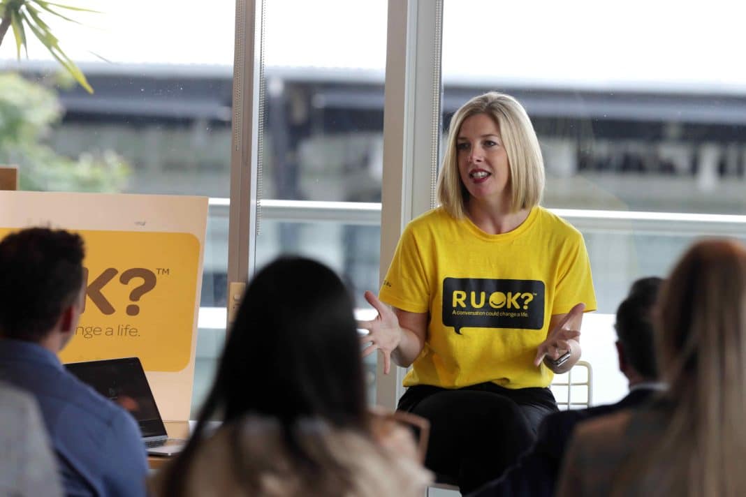 R U OK? CEO Katherine Newton speaks to office workers about the importance of a supportive workplace