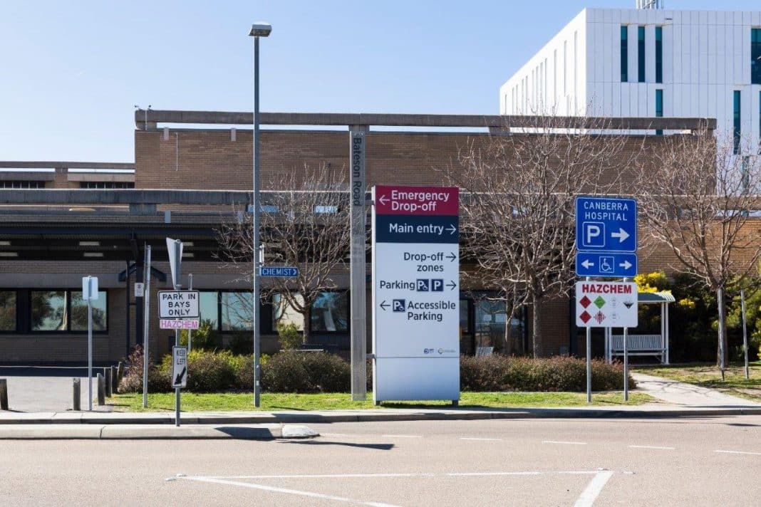 general view of some exterior signage and buildings at Canberra Hospital