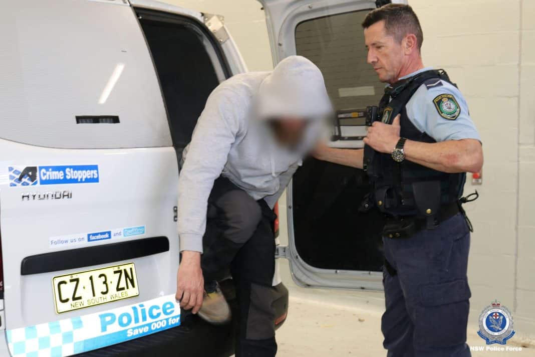 man being arrested by NSW police