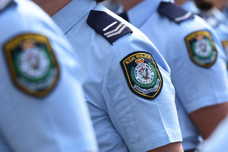 NSW police badges seen on blue uniforms