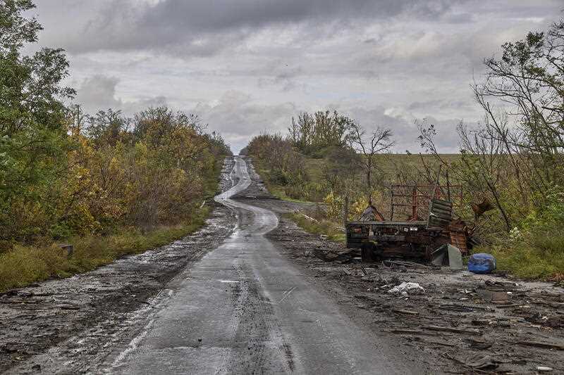 A damaged car on a road about 15 km from Russian border in Kharkiv's area, Ukraine, 03 October 2022, amid Russia's military invasion