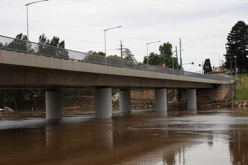floodwaters rising under the Hawkesbury River at Windsor Bridge in Sydney
