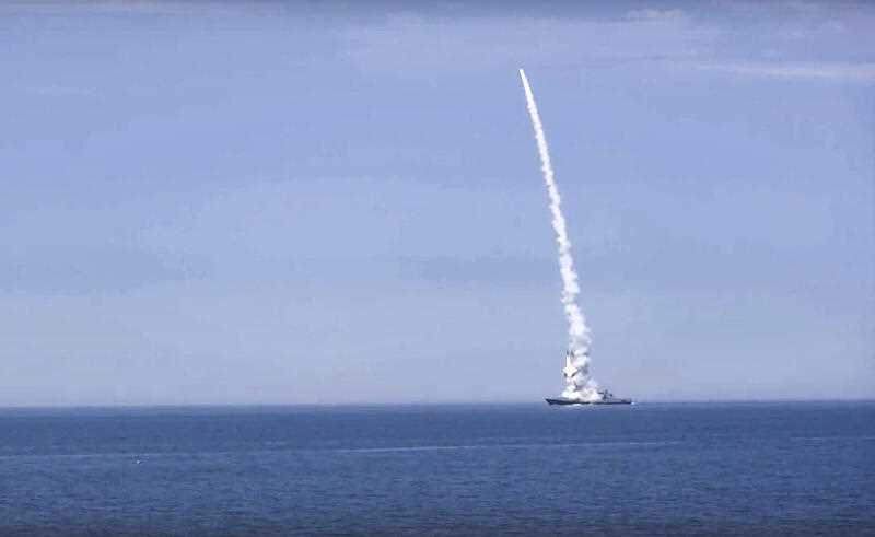 a Russian warship launches a cruise missile at a target in Ukraine