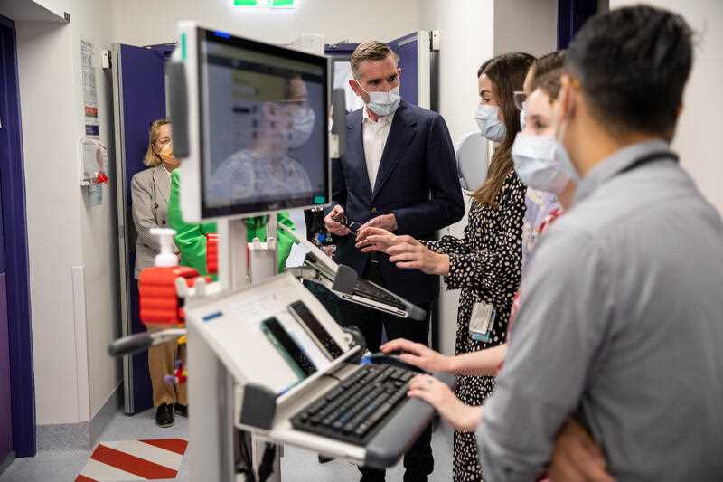 NSW Premier Dominic Perrottet (centre) and Dr Tessa Eves (second right) during a tour of the Royal Prince Alfred Hospital in Sydney, Sunday, November 27, 2022
