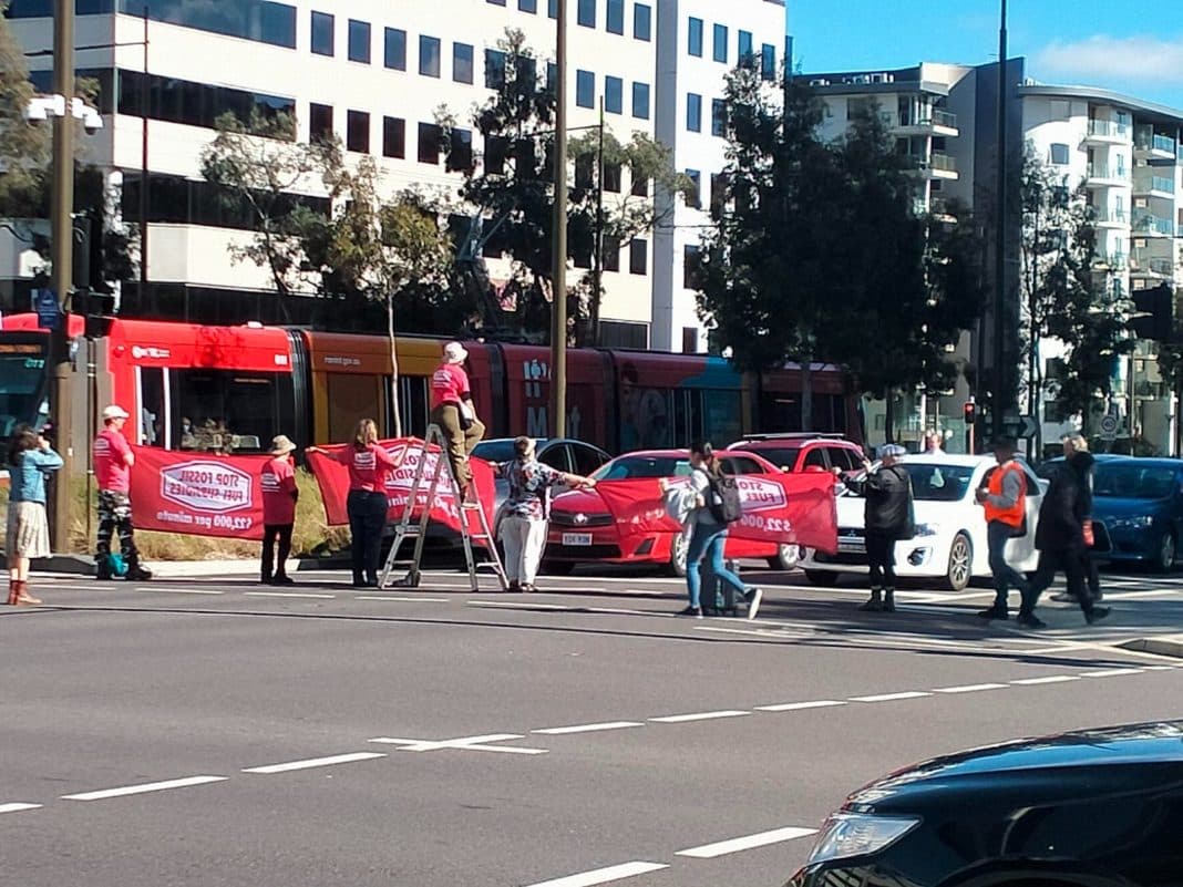 Stop Fossil Fuel Subsidies activists blocking traffic in Civic today. Photo: Stop FFS.
