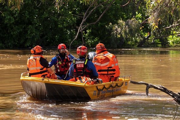 NSW SES volunteers in rescue boat in floodwaters
