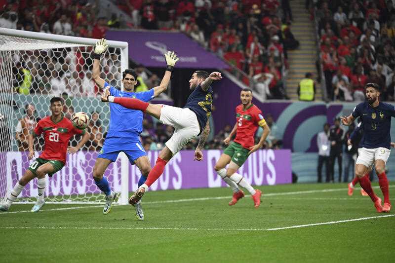 France's Theo HERNANDEZ scores an opener during the FIFA World Cup semi-final match at Al Bayt Stadium in Al Khor, Qatar on December 14, 2022