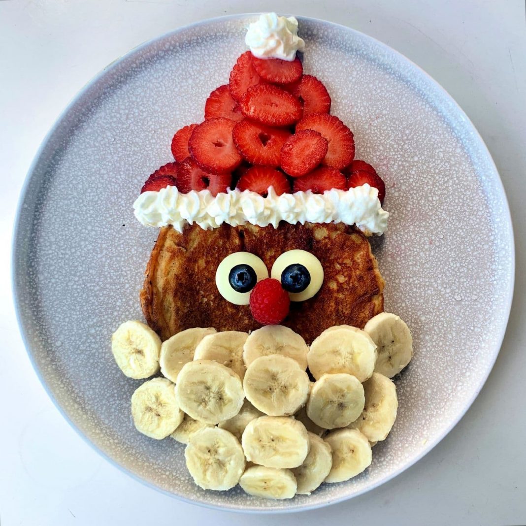 pancake styled with fruit to look like Santa
