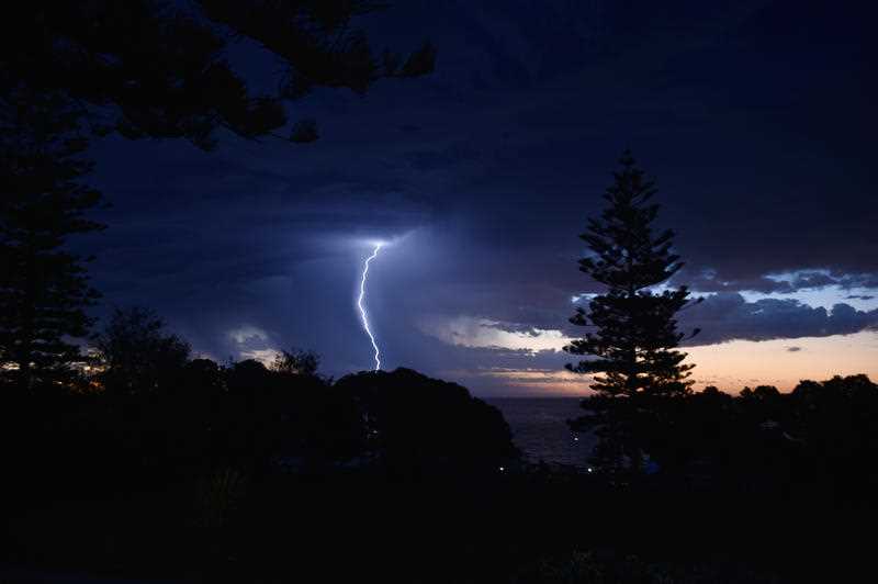 A lightning strike in the night sky