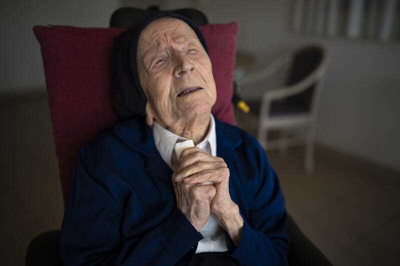 Sister Andre poses for a portrait at the Sainte Catherine Laboure care home in Toulon, southern France, Wednesday, April 27, 2022