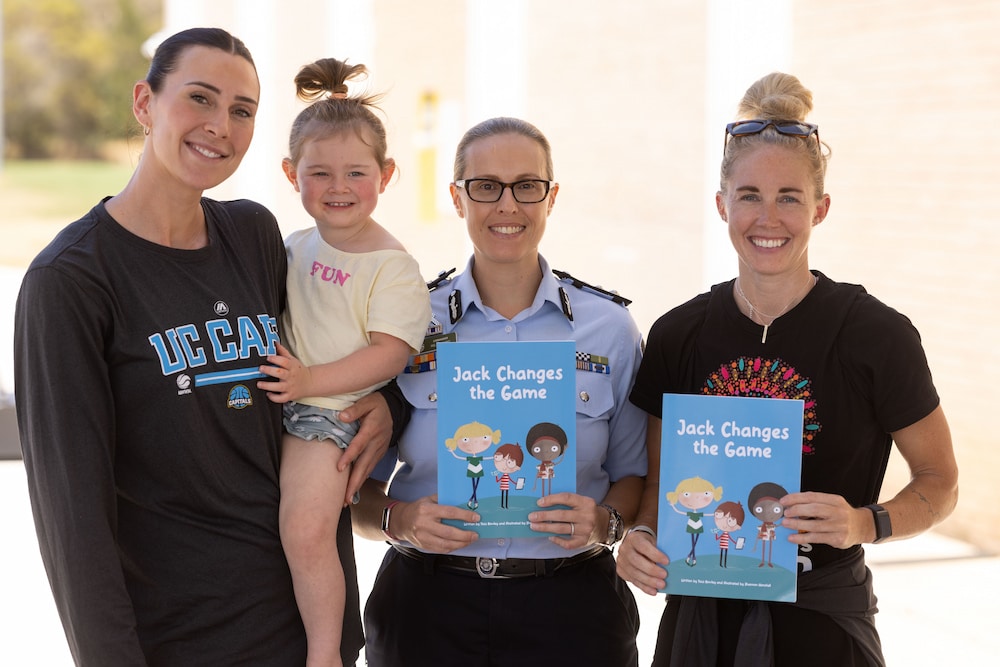 AFP Commander Hilda Sirec launches Tess Rowley’s Jack Changes the Game, with Alex Bunton and Brittany Smart from the University of Canberra Capitals. Photo supplied.