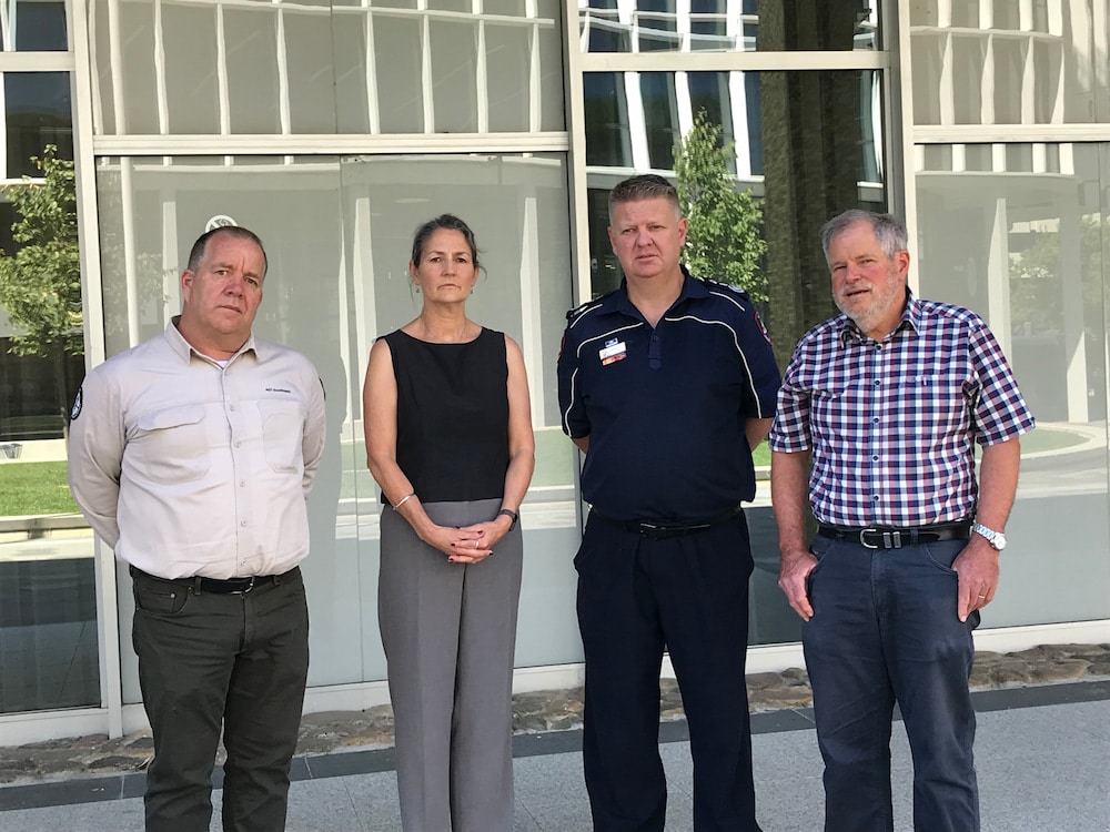 Justin Foley, ACT Parks and Conservation Service; Dr Sally Troy, chair of the ACT Multi Hazard Advisory Council; Rohan Scott, chief officer of the ACT Rural Fire Service; and Dr Tony Bartlett, a forest fire expert and member of the council. Photo: Nicholas Fuller