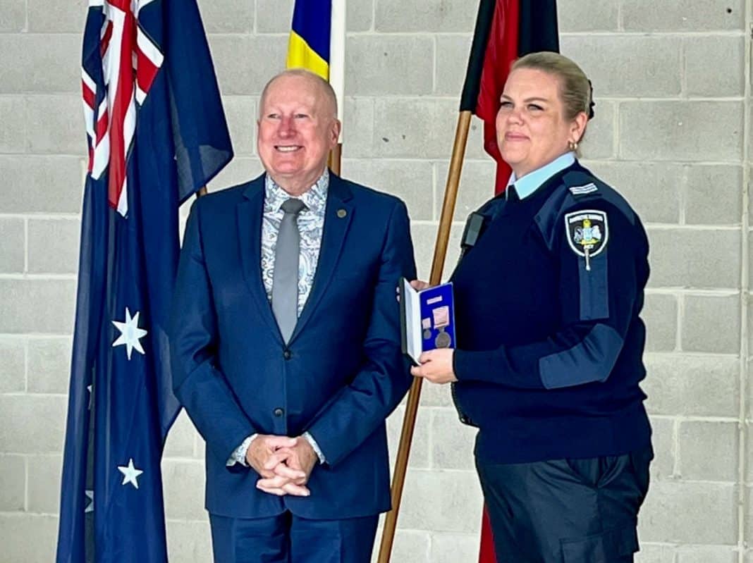 Mick Gentleman, ACT Minister for Corrections, with Corrections Officer Michelle Chalker who received a long service medal. Photo: ACT Government