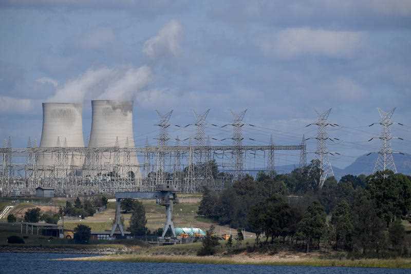 A general view of the Bayswater coal-fired power station cooling towers and electricity distribution wires in Muswellbrook, in the NSW Hunter Valley region
