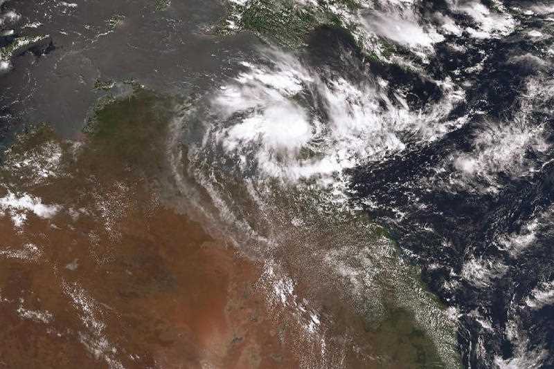 screen grab from a satellite image of a tropical cyclone over far North Queensland
