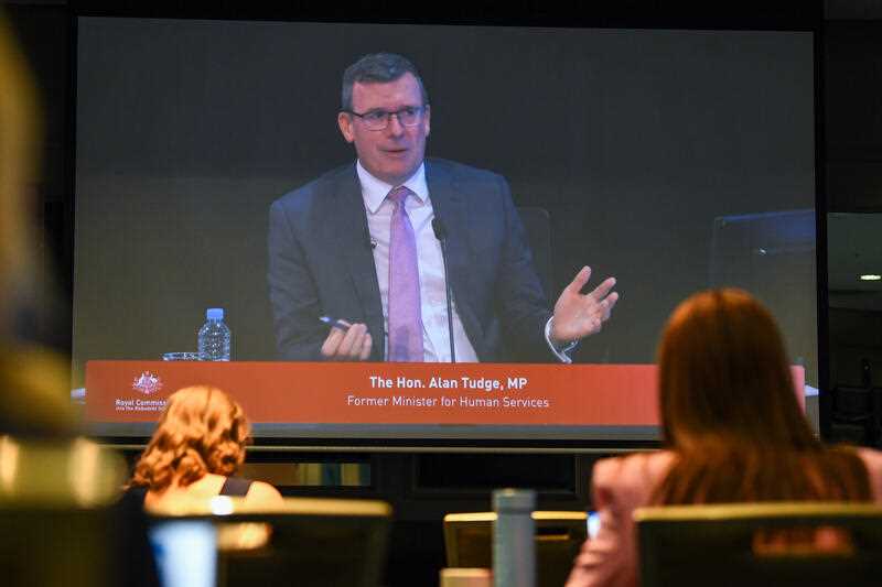 Former Liberal minister Alan Tudge is seen on a screen of the media room at the first hearing block of the Royal Commission into the Robodebt Scheme at the Pullman Brisbane King George Square Hotel, in Brisbane, Wednesday, February 1, 2023