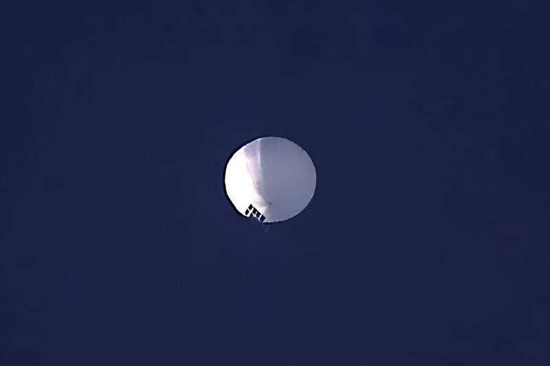 A high altitude balloon floats over Billings, Mont., on Wednesday, Feb. 1, 2023.