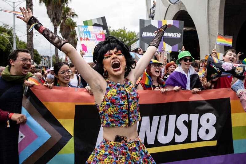 People are seen marching along Fitzory Street during the Midsumma Pride March in St Kilda, Melbourne, Sunday, February 5, 2023.